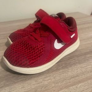 Red Nike sneakers 7c